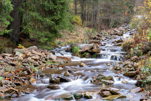 Fototapeta Naklejka Na Ścianę i Meble -  The Vistula River flowing down the slopes of Barania Góra photographed with a long exposure time