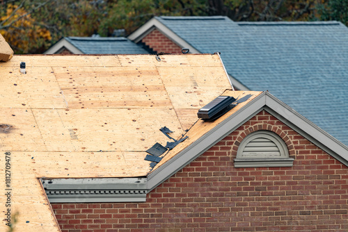 Multifamily dwelling roof replacement with a shallow depth of field