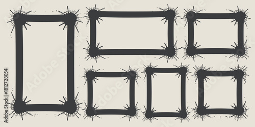 A collection of frames with splattered corners in various rectangular and square shapes on a light background