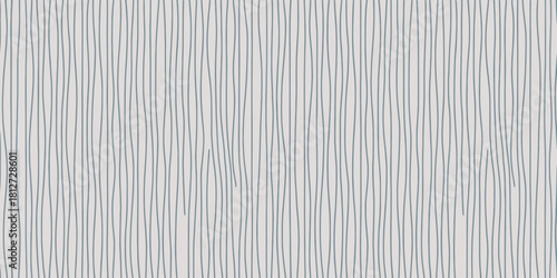 A repetitive pattern of vertical wavy lines in shades of gray against a light gray background design