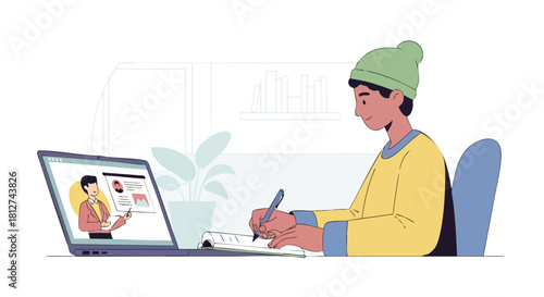 Young male student attending a virtual lecture or class on a laptop and diligently taking notes in a notebook.