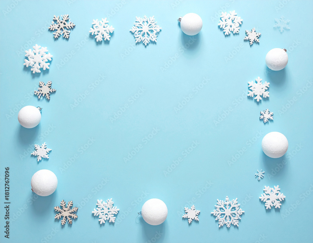 Fototapeta premium Festive Winter Snowflake and Snowball Border on Serene Blue Background.