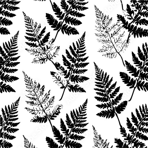 Seamless pattern of fern fronds in black and white creating a natural botanical background design element