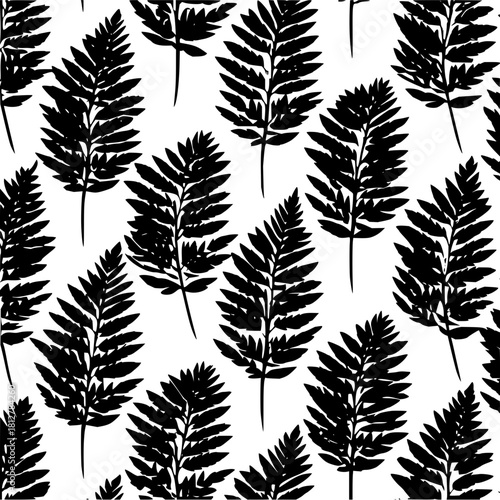 Seamless pattern of stylized fern fronds in black and white creating a nature inspired design look