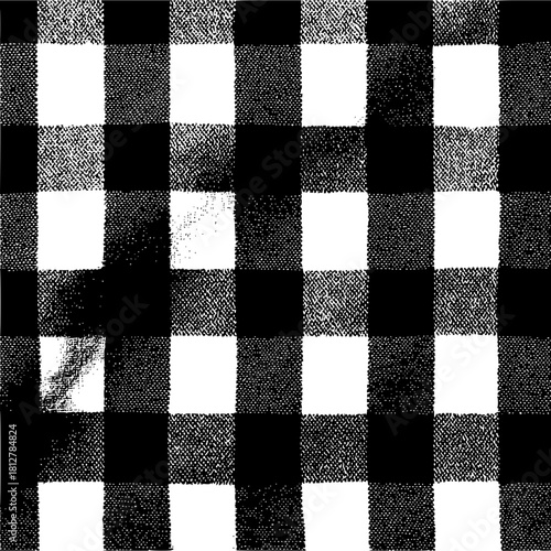 A black and white checkered pattern with varying textures and shades forming square shapes repeating