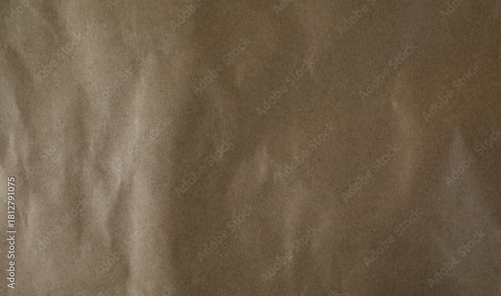 Naklejka premium Brown cardboard background and texture