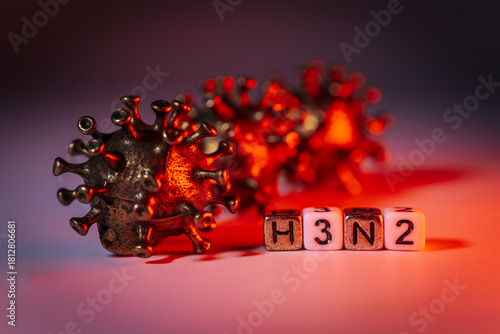 3D illustration of virus models in vibrant colors with H3N2 text, showcasing intricate details and textures, representing the concept of infectious diseases and health awareness