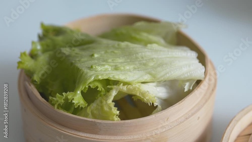 Close-Up of Greens Steaming in a Bamboo Steamer