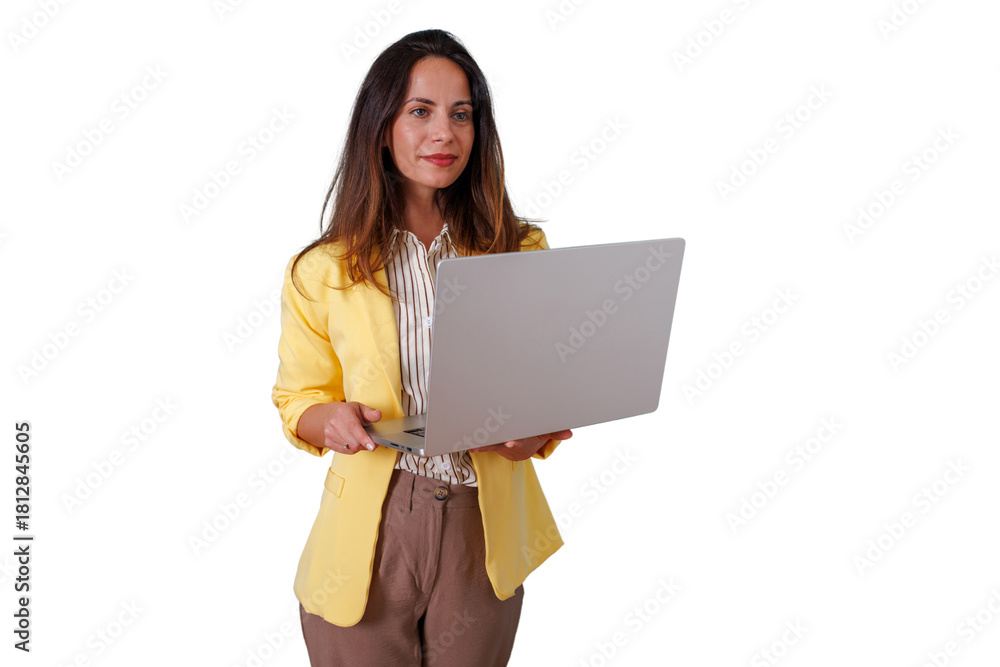 Naklejka premium Young businesswoman with a yellow blazer holding a laptop, standing and working, doing online tasks. Transparent background