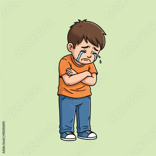 Little boy crying with arms crossed expressing sadness and disappointment.