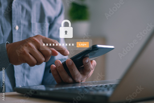 Cyber security, Secure internet access concept. Hand holding a smartphone to login username password on screen. Data privacy online protection on mobile phone application with 2FA increases security.