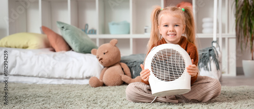 Cute little girl warming ne...