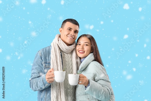 Happy couple in winter clot...