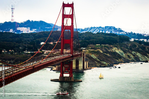 Sailboat and Tour Boat Passing Under Golden Gate Bridge, San Francisco