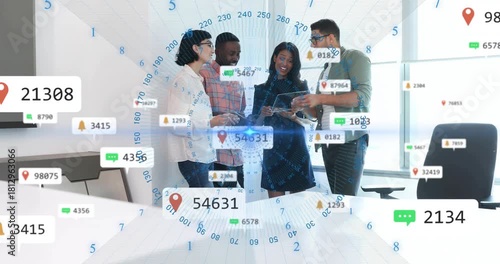 Business team leaning around table tapping and spawning AR ring showing map pins for planning