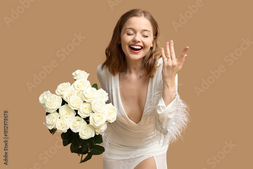 Happy young woman with enga...