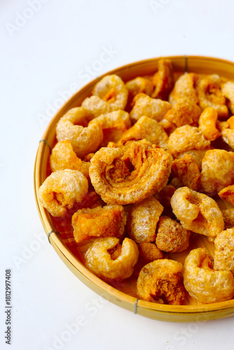 Crispy pork cracklings, a crunchy savory snack.