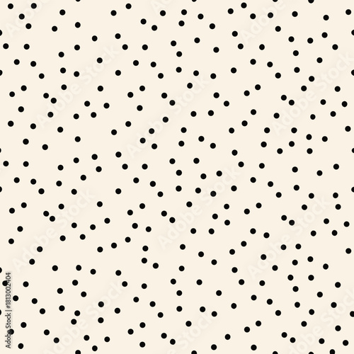 Scattered Black Dots on Cream Background Seamless Pattern