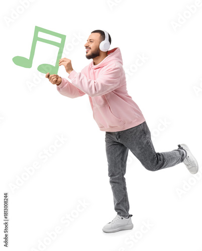 Young man in headphones wit...