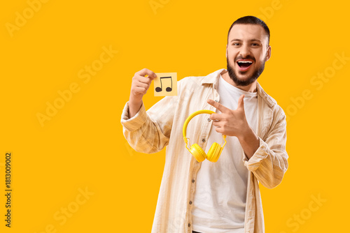 Young man with headphones p...