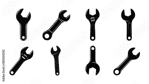 Vector illustration of set of eight black silhouette wrench icons with grunge texture isolated on transparent background 