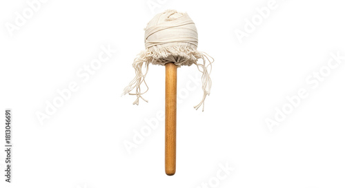 A simple, primitive torch made from a wooden staff and a bundle of cloth rags wrapped with fabric, evoking themes of medieval times, fantasy, or survival