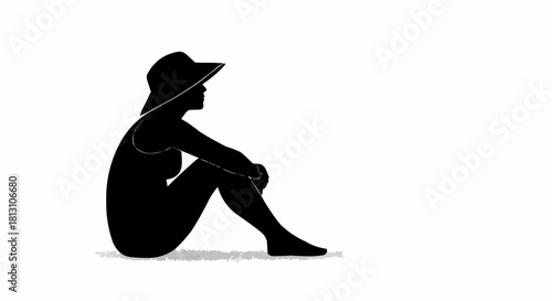 Silhouette of a woman sitting and wearing a hat, thoughtful pose.