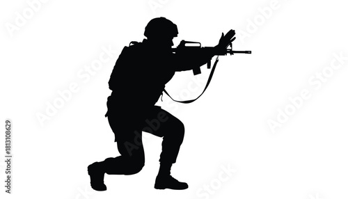 Silhouette of a soldier in tactical gear kneeling and aiming an assault rifle
