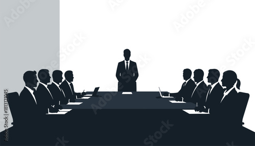 Silhouette of business people sitting around a large conference table with one executive standing and presenting in a formal meeting or board room setting