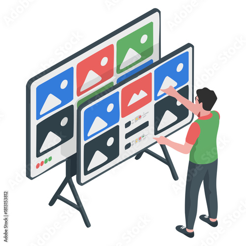 Man interacting with large digital screens displaying content management system interface.