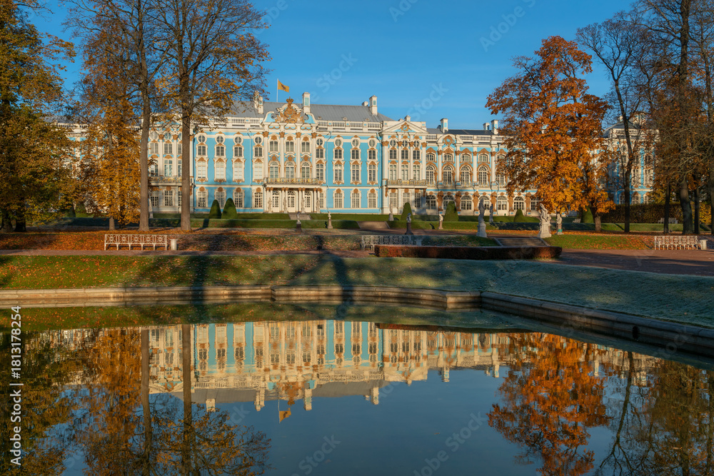 Fototapeta premium Catherine Palace with a reflection in the Mirror Pond if the Catherine Park of Tsarskoye Selo on a sunny autumn day, Pushkin, Saint Petersburg, Russia