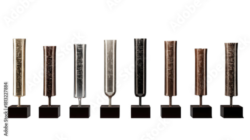 Awards and Trophies Displayed on Black Stands for Achievements in Various Fields of Recognition and Success