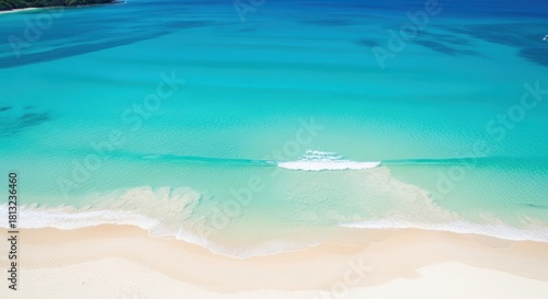 Fototapeta Naklejka Na Ścianę i Meble -  Breathtaking turquoise ocean meeting pristine white sand beach paradise aerial