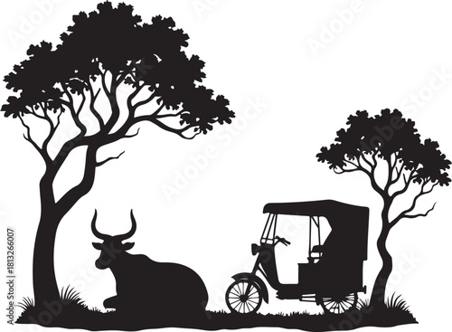 Black silhouette of a cow and auto rickshaw under trees