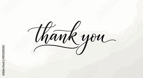Elegant thank you script calligraphy on white background.