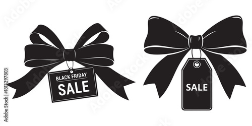 Black bow with sale tag isolated on white