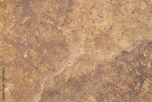 Stone texture close-up, surface. Brown stone background, wallpaper.
