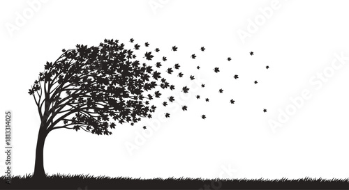 A black silhouette of a tree on a grassy hill with its leaves being blown away by a strong gust of wind on a white background.