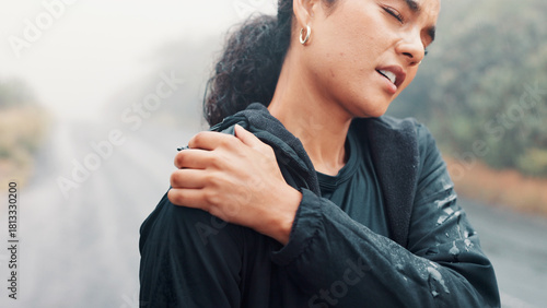Tableau sur toile Outdoor, shoulder pain and woman with fitness, tension and accident with burnout or training