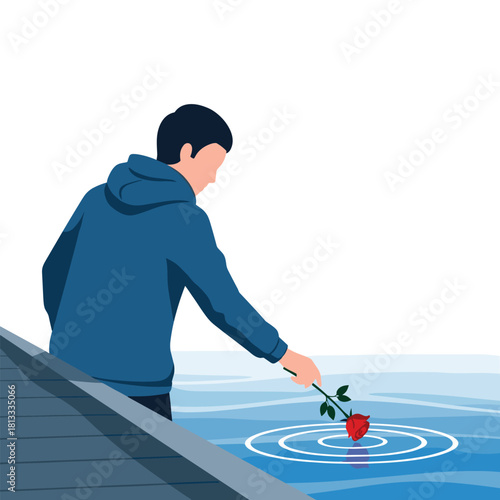 Young man standing on a pier, gently placing a single red rose into the water, creating ripples of farewell or memory.
