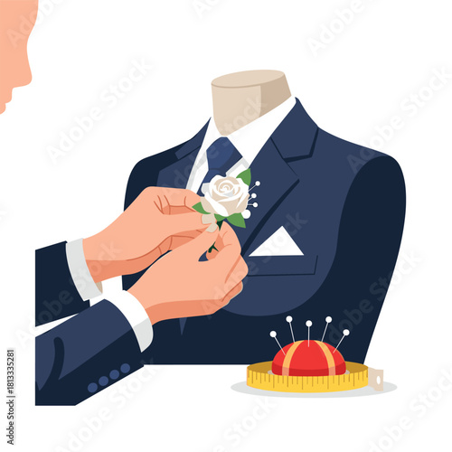 Close-up of hands carefully pinning a delicate white rose boutonniere onto the lapel of a stylish navy blue wedding suit.