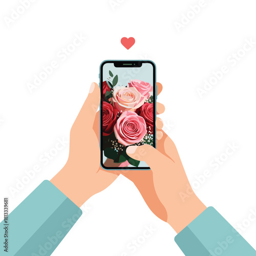 Two hands hold a smartphone, taking a photo or admiring a picture of a beautiful bouquet of pink and red roses, with a small heart icon above the phone.