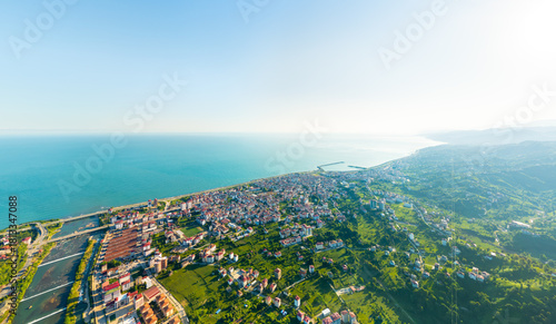 Fototapeta Naklejka Na Ścianę i Meble -  Ardeshen, Turkey. City on the Black Sea coast of Turkey. Firtina River Valley. River mouth. Summer sunny morning. Panorama. Aerial view