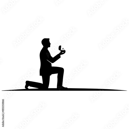 Black Silhouette of Man Kneeling in a Formal Proposal with Ring Box