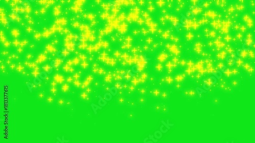 Bright Glittering Sparkles on Vibrant Green Background Creating a Magical Atmosphere