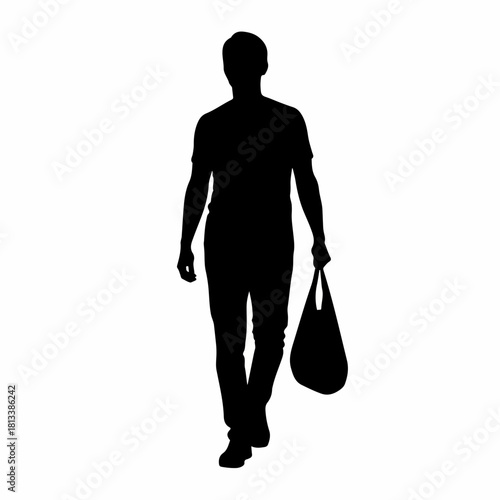Black silhouette of a man walking forward while carrying a bag.