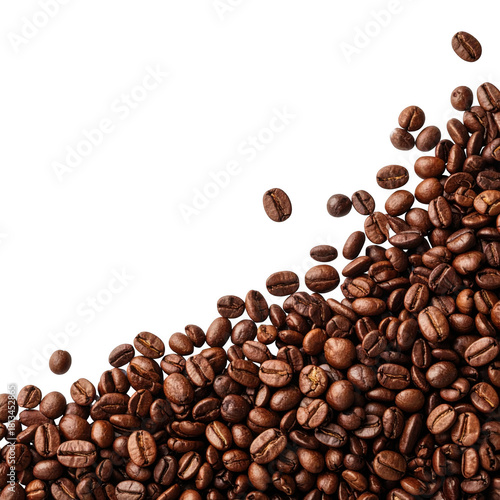 Roasted coffee beans pile, spilling from top corner. Isolated on transparent background