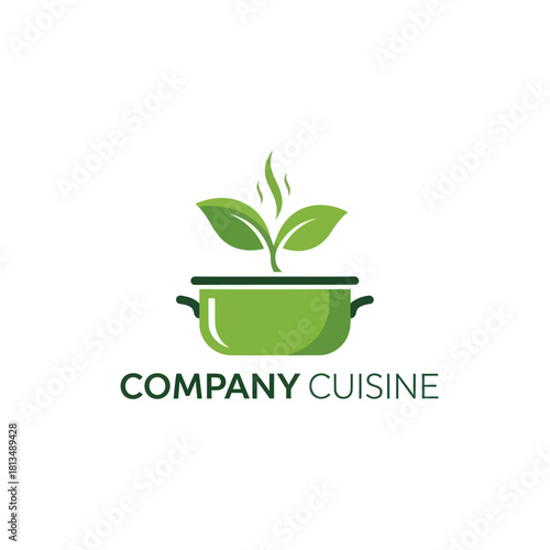 Green cooking pot with fresh leaves and steam representing healthy cuisine.