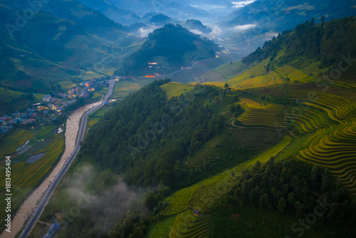 Aerial view of golden rice terraces in Kim Noi commune at Mu Cang Chai town near Sapa city, Vietnam. Beautiful terraced rice field in harvest season in Yen Bai province