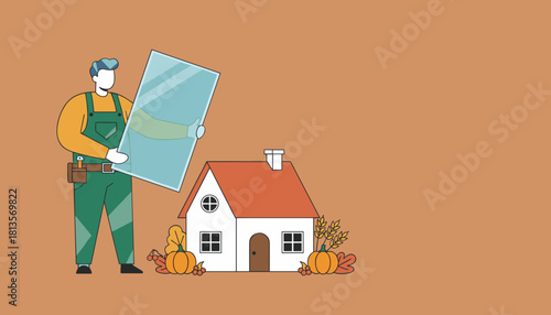 Home service worker installing glass or window pane near a house with autumn decorations